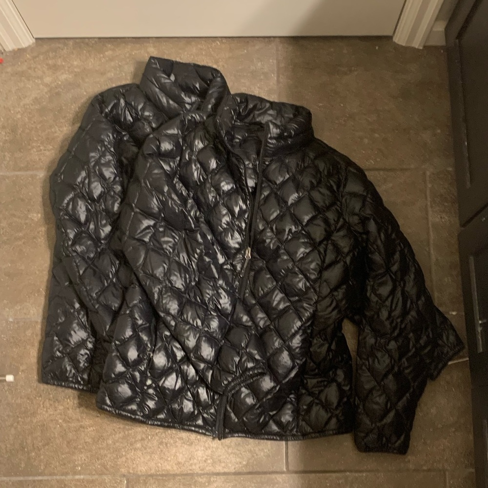 Two black puffer jackets